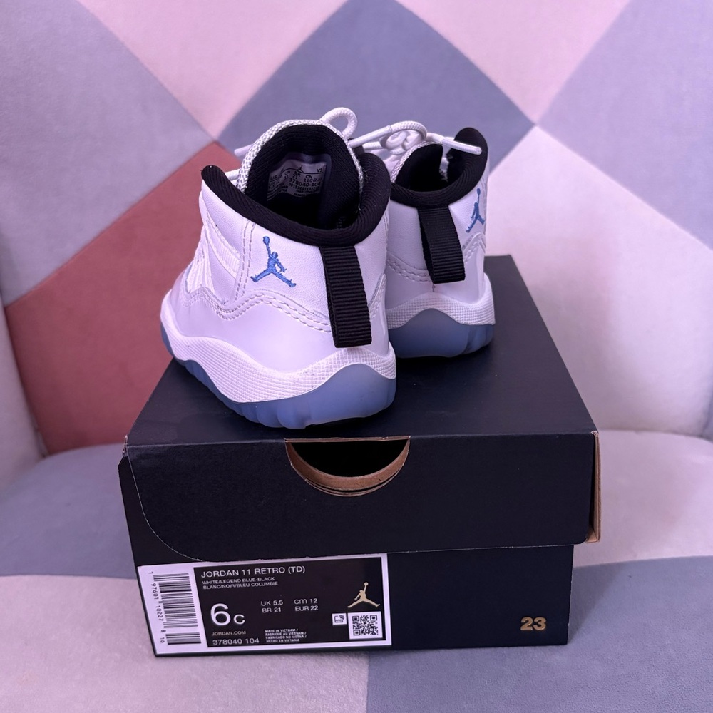 Jordan 11 retro  Kids' White and Blue Sneakers with Black Accents